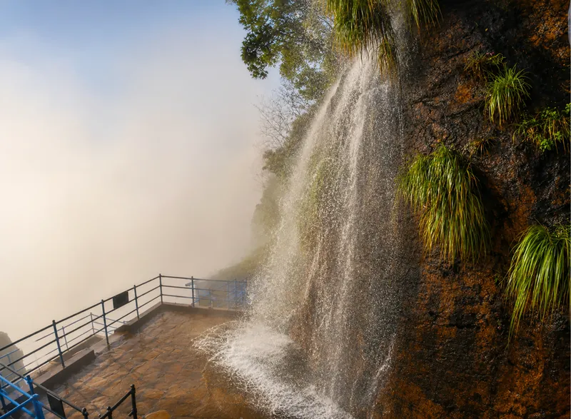 Manikyadhara Falls spilling off the rock face